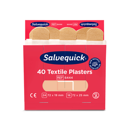 An opened red Orkla Wound Care AB textile plaster box (40 pcs./refill, 6 pieces) shows beige plasters inside and on the front sizes, product information, and certification symbols.