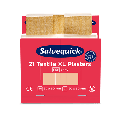A red-white box labeled "Orkla Wound Care AB Xl textile plaster, 21 pieces/mine | Package (6 pieces)" with two beige textile plasters in sizes 80 x 30 mm and 80 x 60 mm, along with product and certification details.