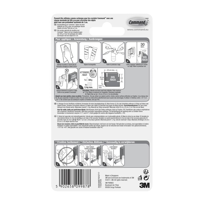 On the back of a package of 3M Deutschland GmbH Kleine Command™ Strips S, 17022N, there are illustrated, multilingual instructions for applying and removing adhesive strips without nails to keep walls damage-free, as well as a barcode at the bottom edge.