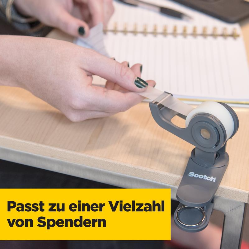 A person pulls Scotch® Magic™ Invisible Tape (19mm x 33m) from 3M Deutschland GmbH from a dispenser on a desk, near which is an open notebook. A yellow box shows: "Value pack with 24 rolls - fits many dispensers."