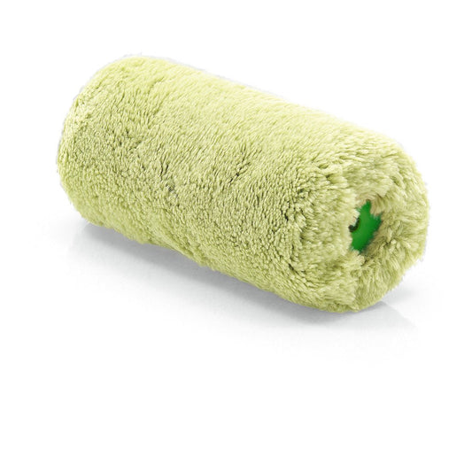 Close-up of a new, unused Nölle Profi Brush facade roller lambswool (Ø 44 mm / pile height 18 mm) by Nölle Profi Brush Buersten- & Pinseltechnik e.K. with a fluffy light green cover and green plastic core on a white background.
