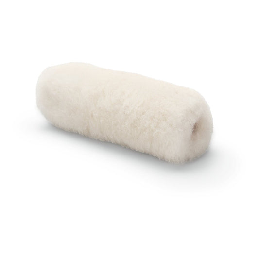 The Nölle Profi Brush paint roller lambskin pile height 20 mm from Nölle Profi Brush Bürsten- & Pinseltechnik e.K., a white cylindrical roller made of fluffy material, lies on its side against a plain white background - ideal for professional painting.
