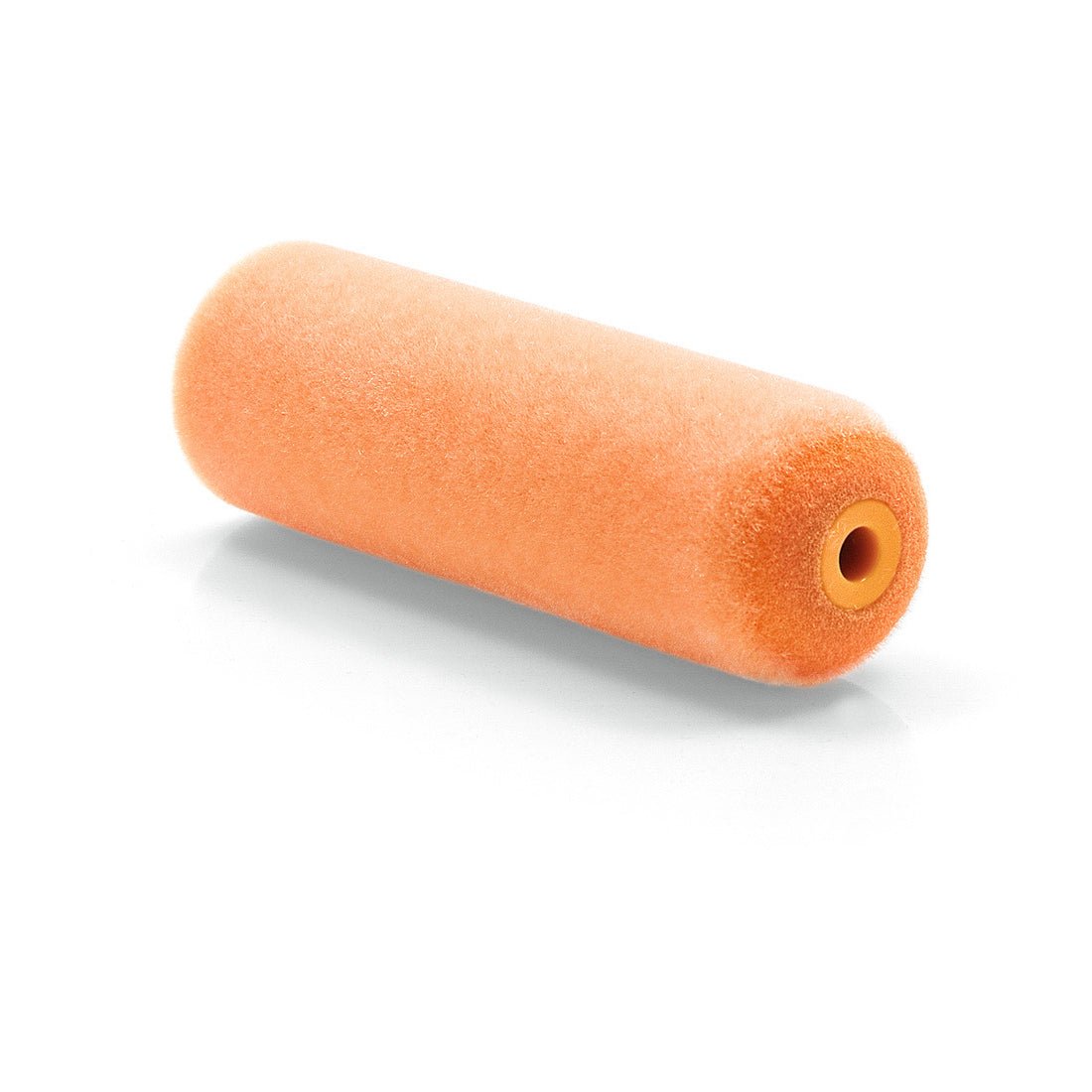 Close-up of a Nölle Profi Brush paint roller Superflock, 10 cm with iron-sided rounding (1 piece), unused, by Nölle Profi Brush brush & paint technology e.K., lying on a white background, with a visible hole in the roller handle.