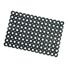 The Nölle Profi Brush rubber honeycomb mat (40x60 cm, 2.3 cm thick) from Nölle Profi Brush Bürsten- & Pinseltechnik e.K. offers increased slip resistance with its black, rectangular design and evenly distributed circular holes.