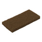 The TASKI Jumbo pads for edge cleaning devices from Diversey Deutschland GmbH & Co. OHG are coarse, brown rectangular scouring pads for professional cleaning, depicted on a white background.