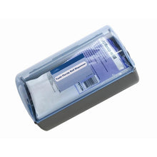 The TASKI Florzip Dispenser 65 from Diversey Deutschland GmbH & Co. OHG is a wall-mounted plastic dispenser with a transparent lid and gray base, supplied with 150 white, oil-soaked cloths (65 x 25 cm) for cleaning.