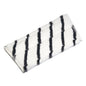 The TASKI Jonmaster Pro scrubbing mop from Diversey Deutschland GmbH & Co. OHG is a rectangular white microfiber pad with five black stripes and is displayed against a plain white background.
