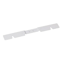 The TASKI accessory holder large (450 mm) from Diversey Deutschland GmbH & Co. OHG is a metal holder with a raised center section, notched edges, and central mounting holes - designed for manual use in cleaning tasks. Package: 1 piece.