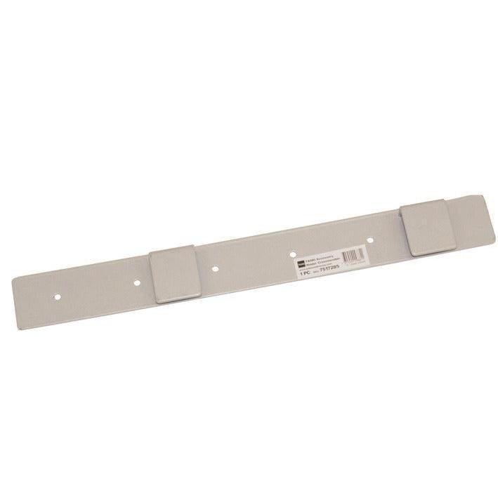 A flat, rectangular metal TASKI accessory holder for crossbars by Diversey Deutschland GmbH & Co. OHG, with four screw holes and two raised tabs, depicted on a white background with a product label. Ideal for cleaning teams and the use of manual cleaning devices.