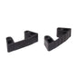 Pictured are two identical black plastic brackets with ribbed sides and cutouts on a white background - part of the TASKI rubber replacement set (2 pieces), suitable for TASKI accessory holder 7517275 from Diversey Deutschland GmbH & Co. OHG.