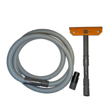 On a white background, a gray flexible hose, a gray-orange floor nozzle, and an adapter from the hand cleaning set, Seter Ha for manual operation (Diversey Deutschland GmbH & Co. OHG), are depicted.