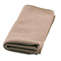 A folded TASKI Jonmaster Ultra Cloth XL cleaning cloth 40x40 cm from Diversey Deutschland GmbH & Co. OHG with a textured surface and sewn edges lies on a white background.