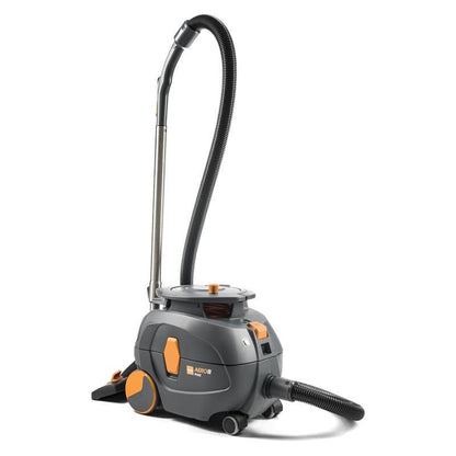 A TASKI AERO 8 PLUS canister vacuum from Diversey Deutschland GmbH & Co. OHG, compact and quiet, with a flexible hose and metal tube, stands on a white background. Package: 1 piece.