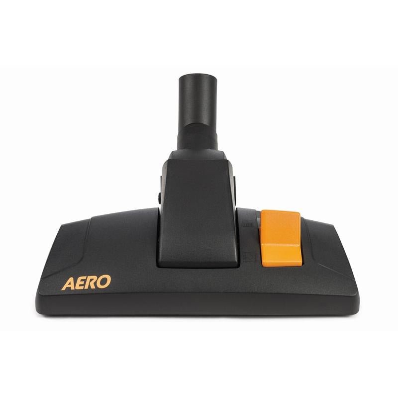 A black TASKI AERO combination roller nozzle 32mm floor nozzle from Diversey Deutschland GmbH & Co. OHG, with yellow "TASKI AERO" on the left side and a large orange button on the right side, depicted on a white background.