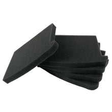 A stack of five black foam motor filters TASKI AERO BP from Diversey Deutschland GmbH & Co. OHG is shown, one pad is standing upright on the stack. These soft, porous filters fit the TASKI Aero BP and are delivered in boxes of 10 pieces.