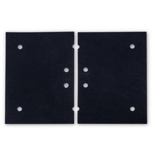 Two rectangular black TASKI Ultimaxx orbital pad holders (14x20 inches, 35x50cm) from Diversey Deutschland GmbH & Co. OHG lie side by side on a white background, each with evenly distributed circular holes - ideal for cleaning large areas with the TASKI Ultimaxx OB series.