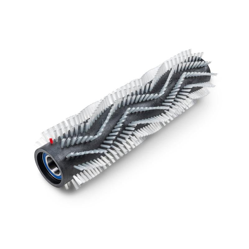 The TASKI Ultimaxx roller brush for exposed aggregate concrete, 55cm from Diversey Deutschland GmbH & Co. OHG is a replacement roller brush with white chevron bristles, a black core, and metal bearings for the TASKI Ultimaxx RB series.