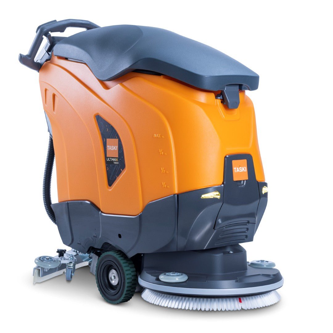 The orange-gray TASKI ULTIMAXX 1900 SD50 Performance BMS 25A EBU from Diversey Deutschland features large wheels, a front brush, a 42-liter tank, and a 50-cm disc for efficient cleaning of large areas. The TASKI logo is located on the side and the back.