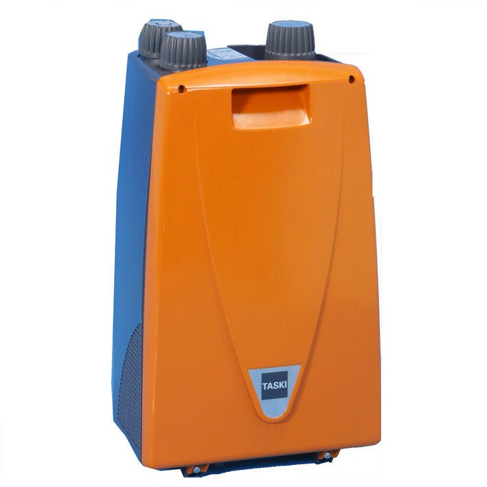 The TASKI ERGODISC FLEXX foam generator 36V from Diversey Deutschland GmbH & Co. OHG is an upright, orange-blue, rectangular cleaning machine component with two gray dials, a front handle, and a small TASKI logo at the base.
