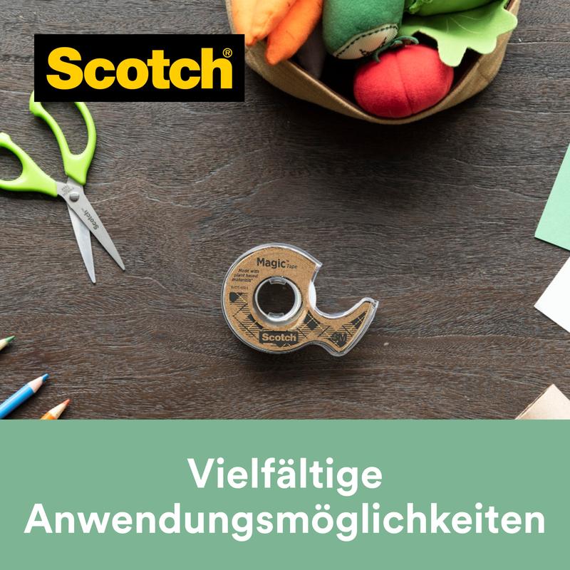 A roll of Scotch® Magic™ Tape (19 mm x 20 m) with 66% plant-based adhesive in a recycling dispenser from 3M Deutschland GmbH lies on wood, surrounded by crafting supplies. Text: "Versatile application possibilities.