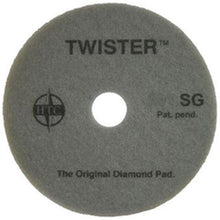 The Twister Pad 10000 from Diversey Deutschland GmbH & Co. OHG is a round, gray pad with "TWISTER SG", "HTC", "Pat. pend." and "The Original Diamond Pad" imprint - ideal for cleaning and polishing hard floors for a brilliant shine.