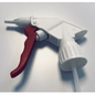 A close-up of the Dr. Schnell spray head RED/WHITE with foam nozzle (1 piece) from DR.SCHNELL GmbH & Co. KGaA - an accessory for hand sprayers with stepless rotary control, lying on a light background.