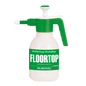 A white plastic spray bottle Dr. Schnell sprayer 1.5 liters from DR.SCHNELL GmbH & Co. KGaA, with a green pump and nozzle, with the inscription "FLOORTOP" in large letters and "DR. SCHNELL" in German script at the bottom.