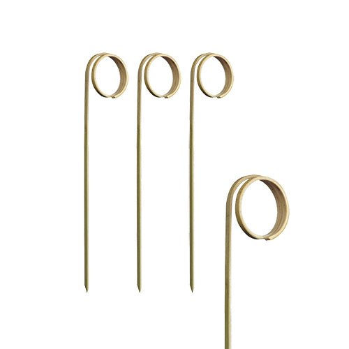 On a white background stand four PAPSTAR 100 finger food picks "pure" made of high-quality plastic with a pointed end and loop from PAPSTAR GmbH – ideal for parties and events.