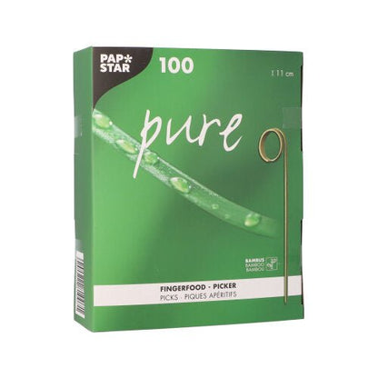 A green box from PAPSTAR GmbH with the inscription "pure" contains 100 finger food picks (11 cm) – perfect for parties. The packaging features a bamboo skewer and a close-up of a green, dewy stem.