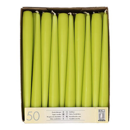 A box with 50 Starpak taper candles, each with a diameter of 2.2 cm and a length of 25 cm, arranged upright in a single layer. The label on the front contains product information and the Starpak brand with a certification logo.
