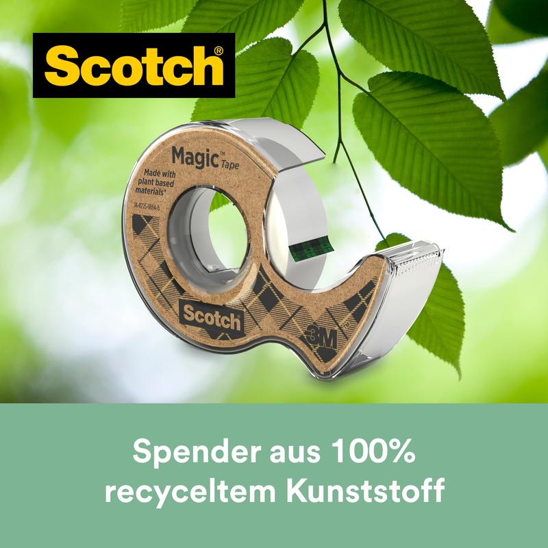 A Scotch® Magic™ Tape (19 mm x 20 m) from 3M Deutschland GmbH - with 66% plant-based adhesive and a dispenser made from recycled material - hangs on a string on a tree, surrounded by green leaves.