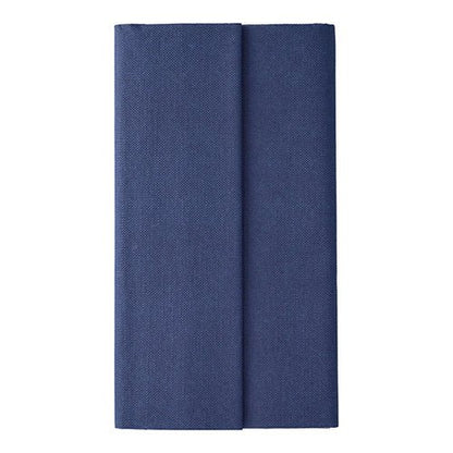 A tablecloth from PAPSTAR GmbH from the ROYAL collection (Tissue, 120 x 180 cm) in dark blue is neatly folded and positioned vertically against a simple white background, highlighting its high quality.