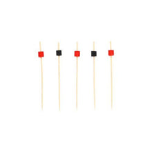 Five PAPSTAR 100 finger food - picks from PAPSTAR GmbH stand vertically, each with a small square pearl at the top area - three red, two black - on a plain white background.