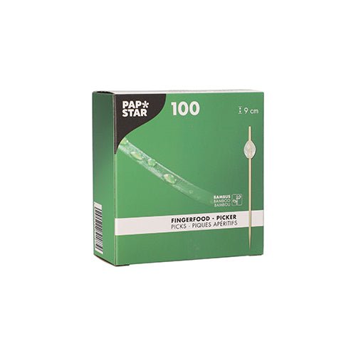 A green box from PAPSTAR GmbH labeled "PAPSTAR 100 Fingerfood - Picker" contains 100 bamboo picks each 9 cm long. The packaging shows an image of the food picker and product information in several languages.