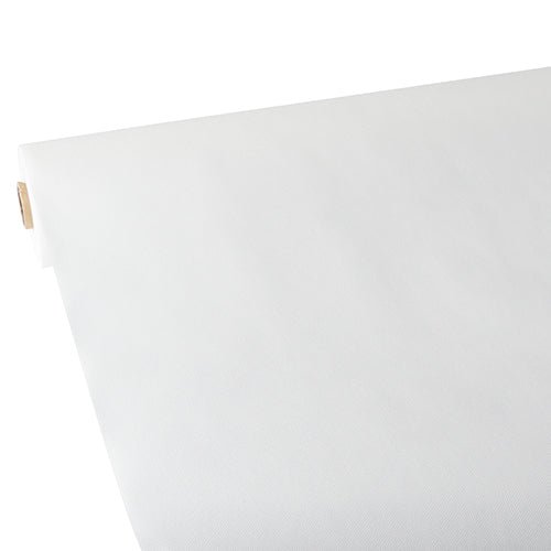 A close-up of a roll of Starpak tablecloth, fabric-like, fleece "Soft Selection", partially unrolled on a flat surface, with the cardboard tube core visible on the left.