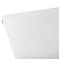 A close-up of a roll of Starpak tablecloth, fabric-like, fleece "Soft Selection", partially unrolled on a flat surface, with the cardboard tube core visible on the left.