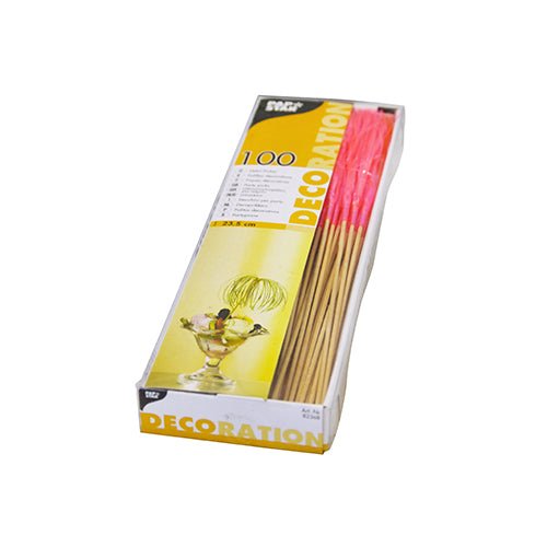 A rectangular box with PAPSTAR 100 decoration picks from PAPSTAR GmbH. With pink tips and robust quality - perfect for stylish presentations. The packaging displays "DECORATION", a dessert glass, and several skewers inside.