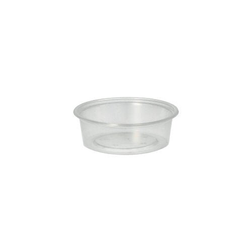 The Starpak 50 dressing cup, PP round Ø 7.1 cm transparent, is a clear, round dressing cup with a flat bottom and angled sides - perfect for catering service.