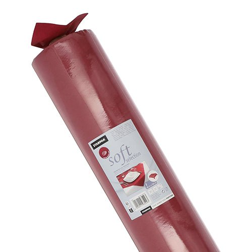 A large roll of Starpak tablecloth, fabric-like fleece “Soft Selection”, is labeled with a barcode, the brand name Starpak, and an image of the tablecloth in use.