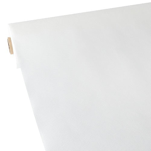 A roll of Starpak tablecloth, fabric-like, fleece “soft selection” in white is rolled out on a flat surface, showing the smooth, light fabric and the partially visible cardboard tube on the left.