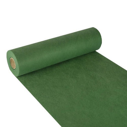 A partially unrolled roll of Starpak table runner, fabric-like fleece "soft selection" (24 m x 40 cm), in green, is depicted on a white background. The thick material has a smooth, fabric-like texture.