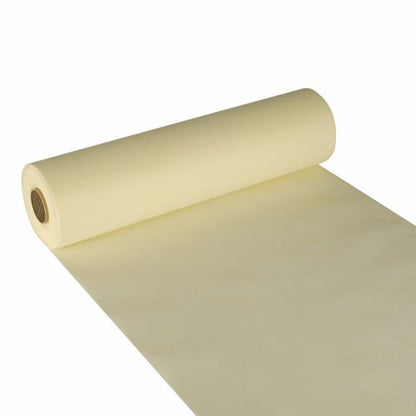 The Starpak table runner, fabric-like fleece "soft selection" (24 m x 40 cm), in soft yellow is shown here partially unrolled with visible inner tube - perfect as an elegant table runner for stylish ambiance.