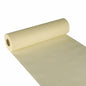 The Starpak table runner, fabric-like fleece "soft selection" (24 m x 40 cm), in soft yellow is shown here partially unrolled with visible inner tube - perfect as an elegant table runner for stylish ambiance.