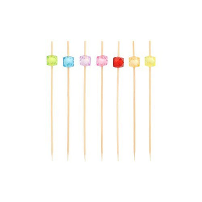 Six PAPSTAR 100 finger food - picks from PAPSTAR GmbH stand vertically, each with a unique colored square pearl - green, blue, pink, purple, red, and yellow - against a plain white background for a stylish presentation.