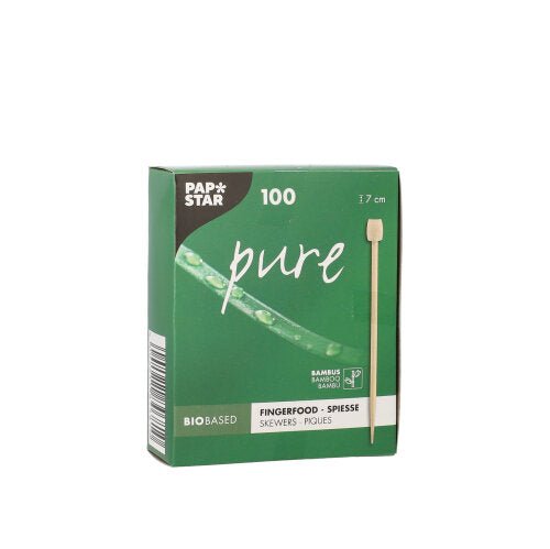 A green box labeled "PAPSTAR 100 Fingerfood - Picker" from PAPSTAR GmbH contains 100 bamboo skewers each 7 cm long. The front shows a skewer image and advertises this bio-based, writable chalkboard product.