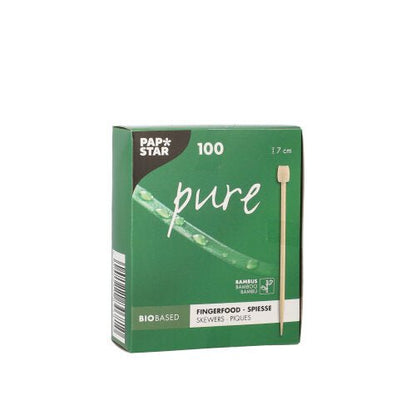 A green box labeled "PAPSTAR 100 Fingerfood - Picker" from PAPSTAR GmbH contains 100 bamboo skewers each 7 cm long. The front shows a skewer image and advertises this bio-based, writable chalkboard product.