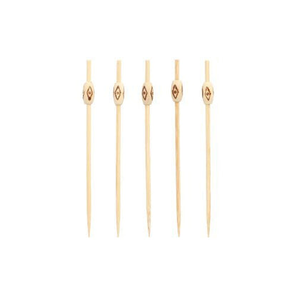 Five PAPSTAR 100 finger food - picks from PAPSTAR GmbH, each adorned with decorative oval pearls, stand vertically in a row against a plain white background.