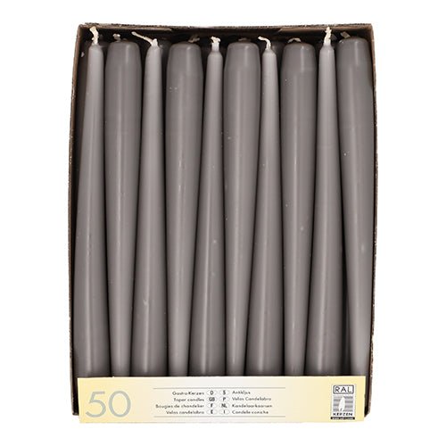 A box of Starpak 50 taper candles Ø 2.2 cm - 25 cm, neatly arranged and labeled with "50 pieces" - perfect for any occasion with their long burning time.