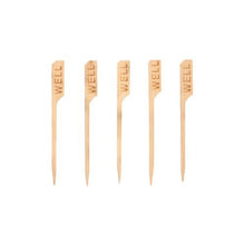 Five PAPSTAR 250 steak markers 9 cm from PAPSTAR GmbH, each engraved with "WELL", are arranged in a row, ideal for restaurants to clearly mark well-done steaks.