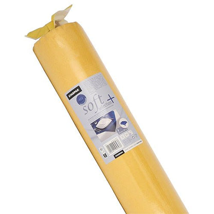 A rolled-up Starpak tablecloth, fabric-like, fleece "soft selection plus" with a product label featuring the Starpak brand, usage instructions, and a photo offering similar comfort to a fabric-like mattress pad.